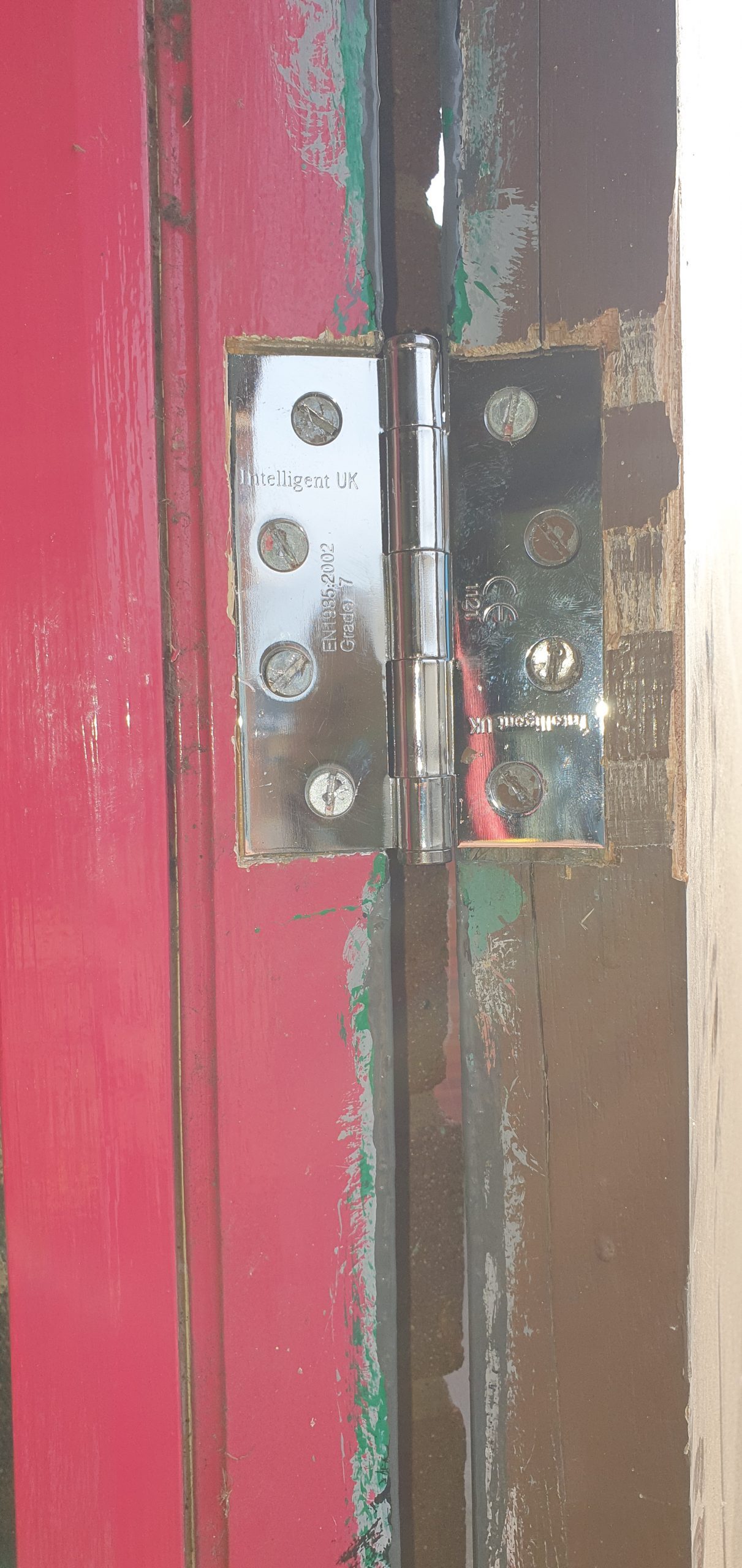 Lock broken. Didn't want to put a hole in the metal door, so I took the hinges off and then replaced them